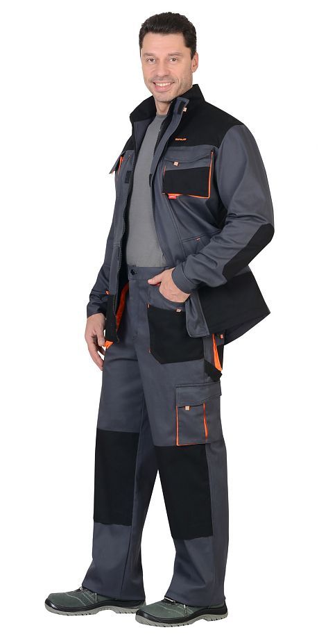 Modern e-commerce fulfillment center workers in Saudi Arabia wearing specialized uniforms designed for efficiency, safety, and technology integration